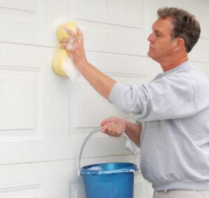 preventing garage door rust wash regularly